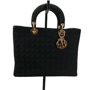 Authentic Christian’s Dior- Lady Cannage Mini handbag includes authenticity card